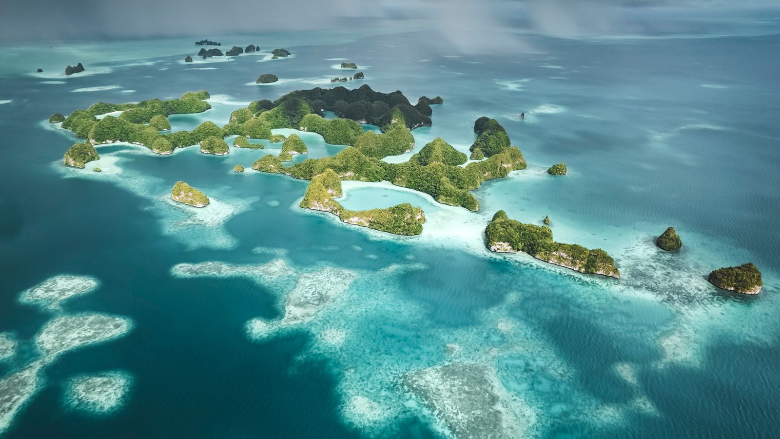 Limestone rock islands in turquoise water in Palau.